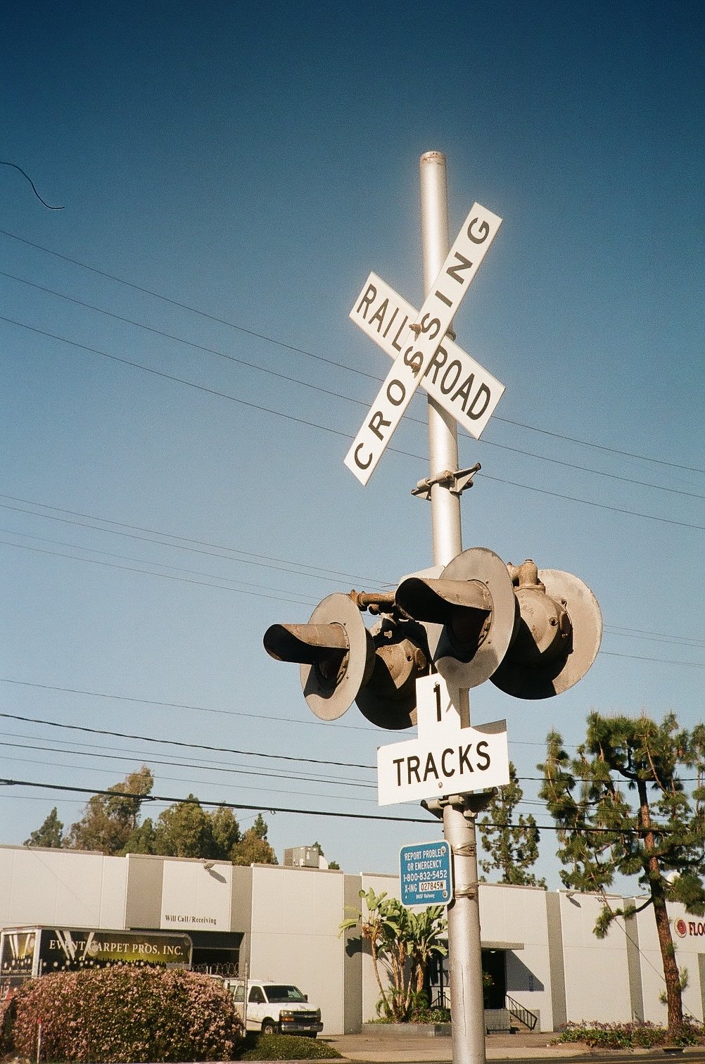 Railroad signal in a summer day