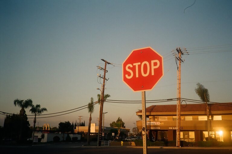 stop sign at sunset