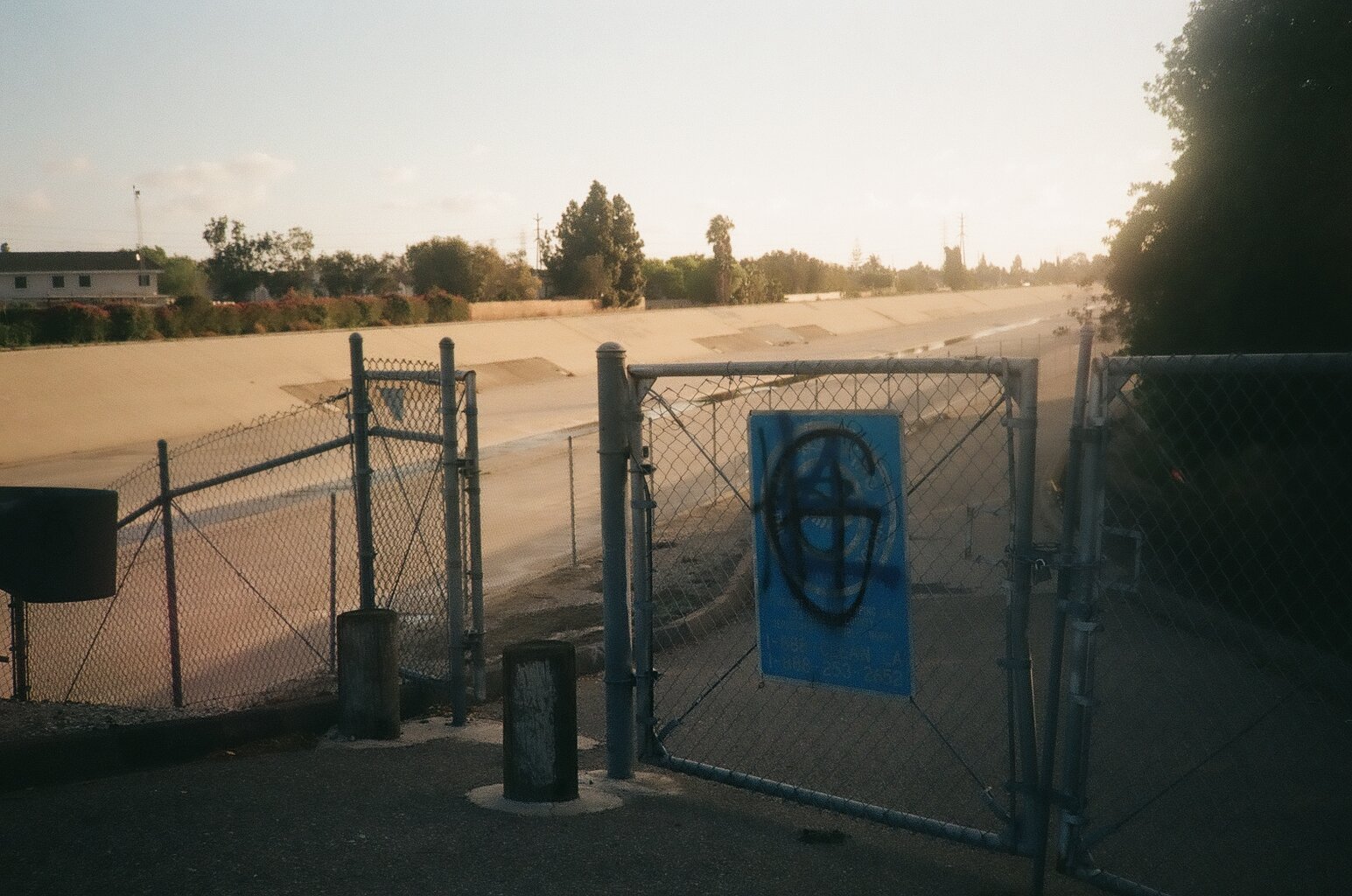 abandoned gate near the river